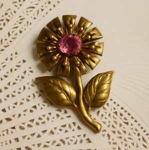 Gold Flower Brooch with Pink Gem